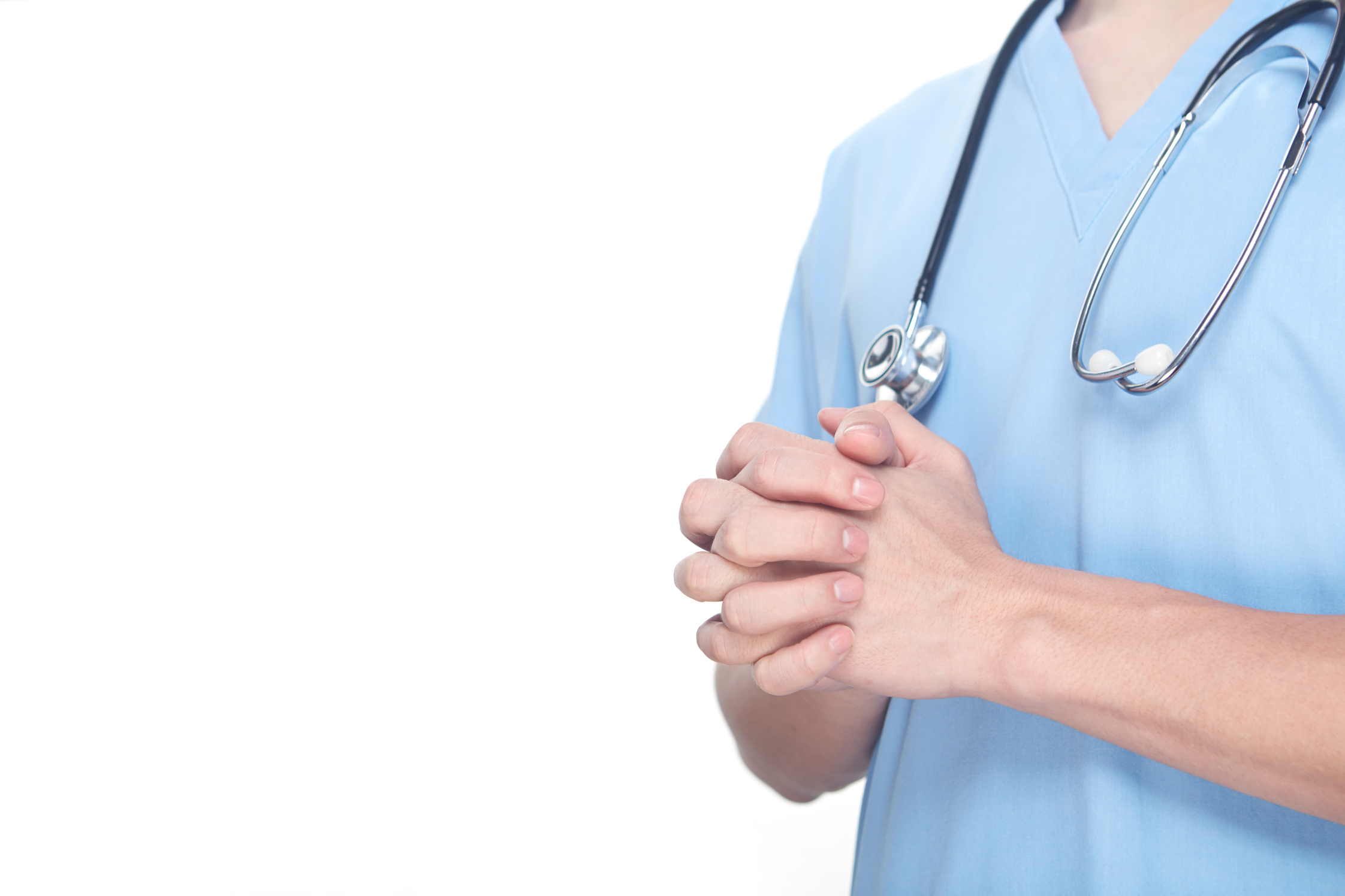 Medical personnel with clasped hands